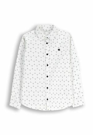 Biała koszula z długim rękawem z czarnym geometrycznym wzorem, zapinana na guziki z kołnierzykiem typu button-down i małym haftowanym logo. Czarna guziki z przodu.