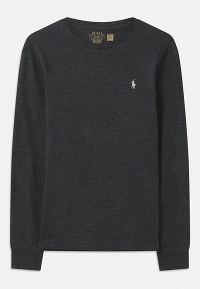 Mørkegrå langermet skjorte laget av bomull. Har rund hals og en liten brodert logo på venstre bryst. Myk tekstur.