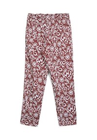 Pantaloni larghi con motivi astratti complessi in maroon e bianco e forme irregolari sul tessuto.