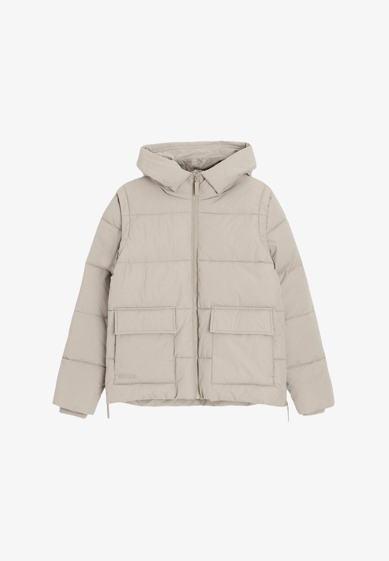 Kurtka puchowa w jasnym beżu, z kapturem, z przodu zapinana na zamek, z dwiema dużymi kieszeniami naszytymi, pikowanym wzorem i regulowanym dołem.