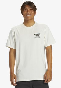White cotton T-shirt with a crew neck and short sleeves, featuring a colorful butterfly graphic and "Quiksilver" text on the chest.
