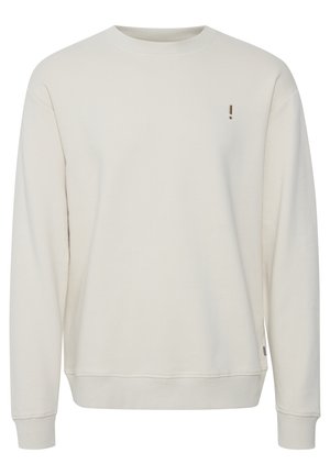 Light beige sweatshirt in a relaxed fit, long sleeves, ribbed neckline and cuffs, features a small logo on the chest, made from soft fabric.