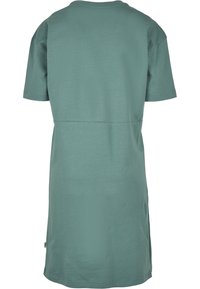 Jurk met korte mouwen in gedempt groen, gemaakt van zacht katoen. Heeft een losse pasvorm en een rechte zoom. De achterkant is eenvoudig ontworpen met een gladde textuur.