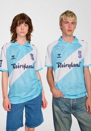 Light blue and white team jerseys with diagonal stripe design, featuring logo and "Dairyland" text, made from breathable fabric.