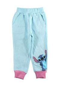 Pantalon de survêtement bleu clair avec une taille côtelée et des poignets roses. Présente un personnage imprimé sur la jambe gauche, fabriqué en tissu doux.