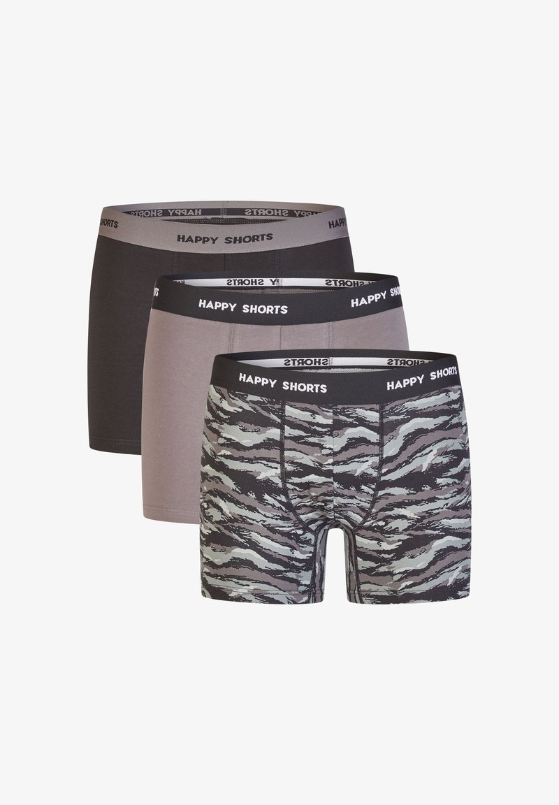 Drei Paar Herrenboxershorts: eine in einfarbig schwarz, eine in einfarbig grau und eine mit einem grauen und schwarzen Tigerstreifenmuster. Alle haben elastische Bündchen.