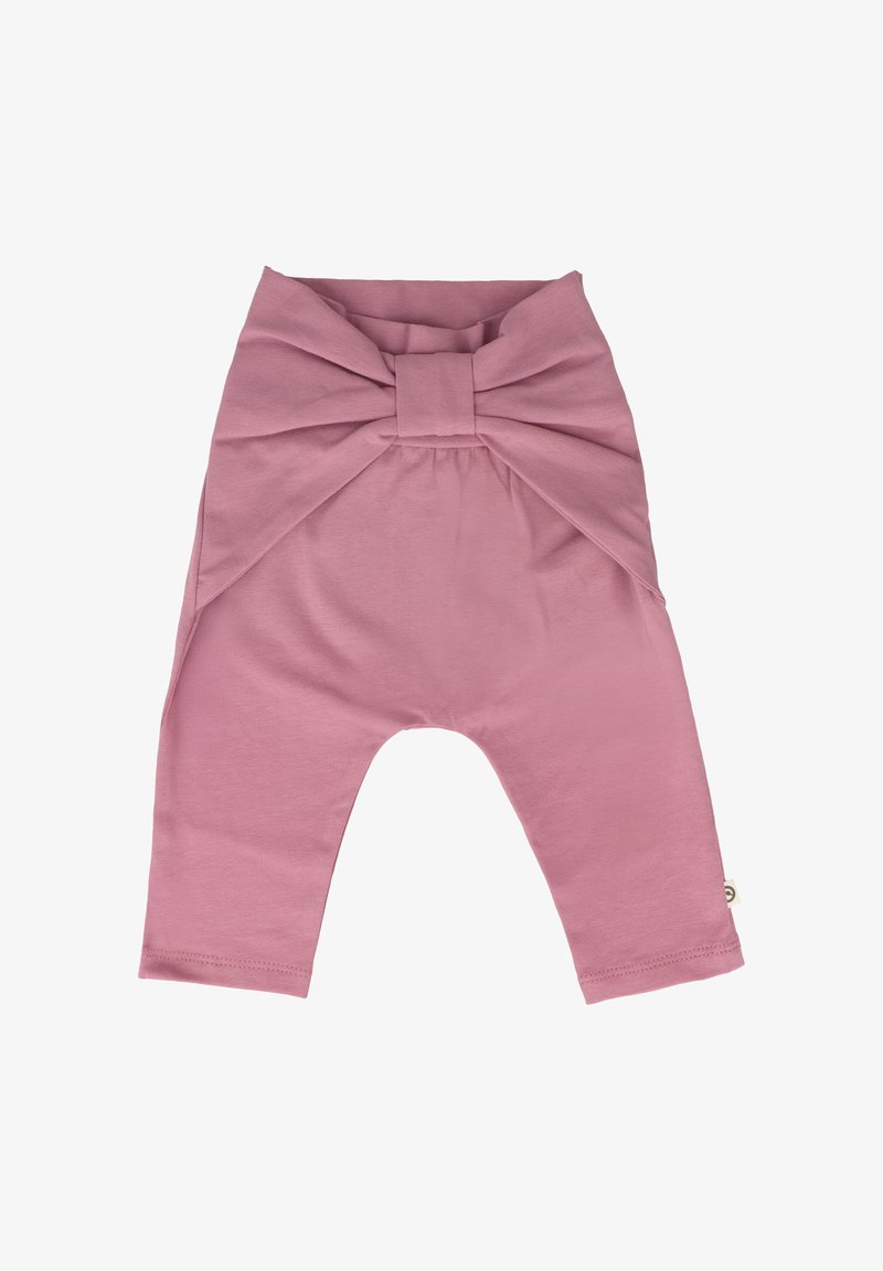 Růžové bavlněné legíny s velkou mašlí v pase a zúženými nohavicemi, s hladkou texturou a elastickým pasem.