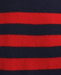 Közelkép kötött anyagról, amelyen váltakozó vízszintes piros és sötétkék csíkok találhatók.