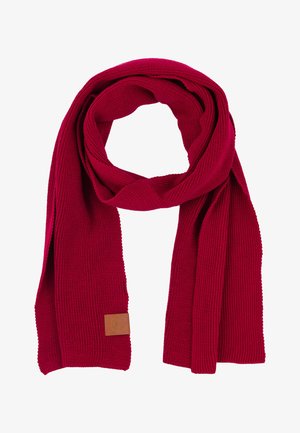 Czerwony, wełniany szalik o teksturowanym wzorze, z brązową skórzaną metką. Miękki i wydłużony kształt zapewniający ciepło i funkcjonalność.