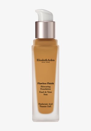 Bouteille en verre avec un distributeur à pompe, section inférieure transparente et section supérieure beige. Étiquettes de texte en noir, présentant des ingrédients tels que l'acide hyaluronique.