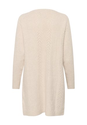 Kreemikaardigan pehmea kudumise tekstuuriga, millel on siksakiline muster ja kolmveerandvarrukad. Disain on lihtne ja piklik.