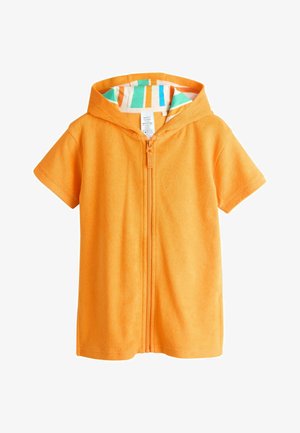 Pomarańczowe poncho ręcznikowe z krótkim rękawem, kapturem i zamkiem błyskawicznym, z kolorową, wielopasmową podszewką kaptura dla malucha.