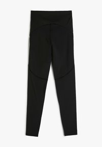 Zwarte leggings van zacht, rekbaar materiaal; met een hoge tailleband, een slank ontwerp en accentnaden die een contoureffect creëren.