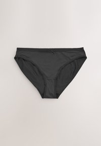 Culotte bikini noire pour femme avec un petit nœud au centre devant et un bord festonné sur les bords, posée à plat sur une surface unie.