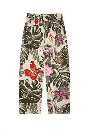 Locker sitzende Hosen mit elastischem Bund, die einen großen tropischen Blumenprint in Rot, Pink, Schwarz und Grau auf cremefarbenem Hintergrund zeigen.