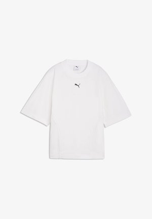 Tricou alb supradimensionat cu mâneci scurte, cu logo Puma negru centrat sub gulerul rotund.