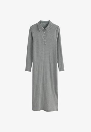 Csíkos, hosszú ujjú ruha, gallérral, gombos kivágással; fekete-fehér színkombináció; puha, könnyű anyagból készült.