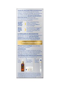 NIVEA Q10 Anti-Falten Expertenbox, mit orangefarbener und blauer Schrift, einem goldenen dermatologischen Zertifizierungsvermerk und Produktanweisungen.