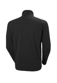 Chaqueta de forro polar negra con un cuello alto, mangas largas y una textura suave. Sin patrones visibles ni detalles metálicos. Diseño simple y funcional.