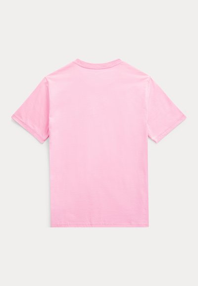 T-shirt en coton rose uni à manches courtes, posé à plat, vu de dos sur fond blanc.
