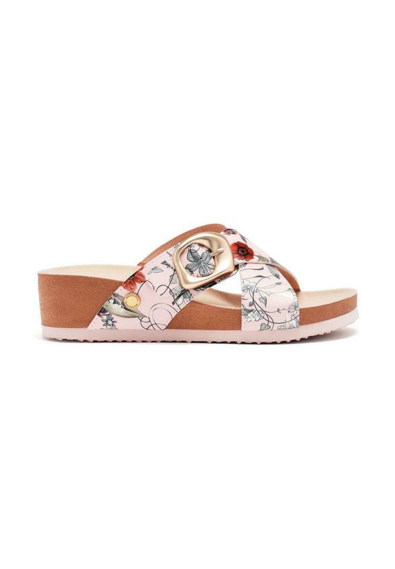 Sandale à glissière florale rose avec une base en liège brun contrastante et un accent métallique décoratif sur la lanière. Semelle intérieure texturée.
