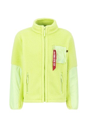 Fluorescent yellow fleece jacket with textured body, soft pale green nylon sleeves, zippered pockets, and a decorative ribbon tag.