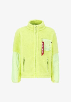 Fluorescentgelbe Fleecejacke mit strukturiertem Körper, weichen hellgrünen NylonÄrmeln, Reißverschlusstaschen und einem dekorativen Bändertag.