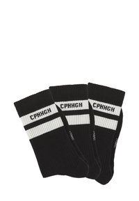 Trīs melnu riboto zeķu pāri ar baltām un melnām svītrām un tekstu "CPHHGH" augšējā malā, izlikti uz balta fona.