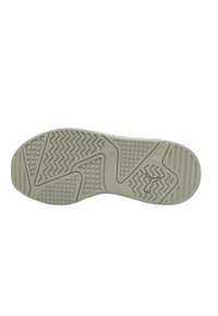 Semelle en caoutchouc beige clair avec des motifs texturés comprenant des lignes ondulées et de petites bosses, arborant un logo dans la zone du talon.