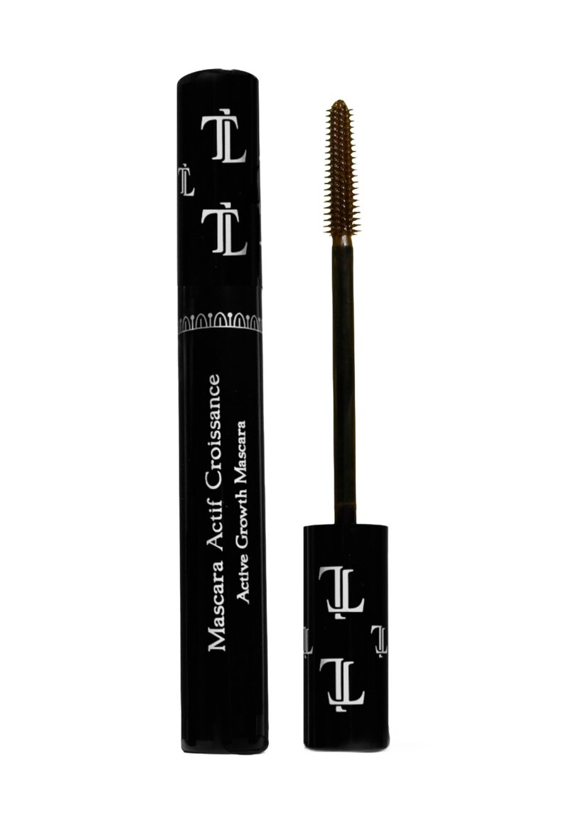 Schwarze Mascara-Tube mit weißem Logo und Text. Begleitet von einem schlanken, goldenen Applikator mit kurzen, gleichmäßig verteilten Borsten zur Anwendung.