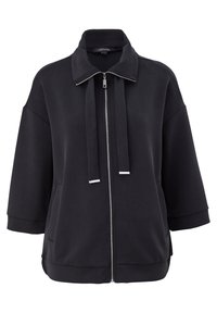 Veste noire à fermeture éclair avec col large, cordons, manches trois-quarts et poches latérales, présentée sur fond blanc.