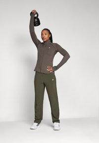 adidas Performance TRAINING COVER-UP - Træningsjakke - shadow olive