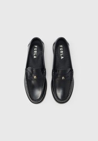 Black leather loafers with a smooth texture, feature a braided accent and a small gold logo. Insides have perforations for breathability.