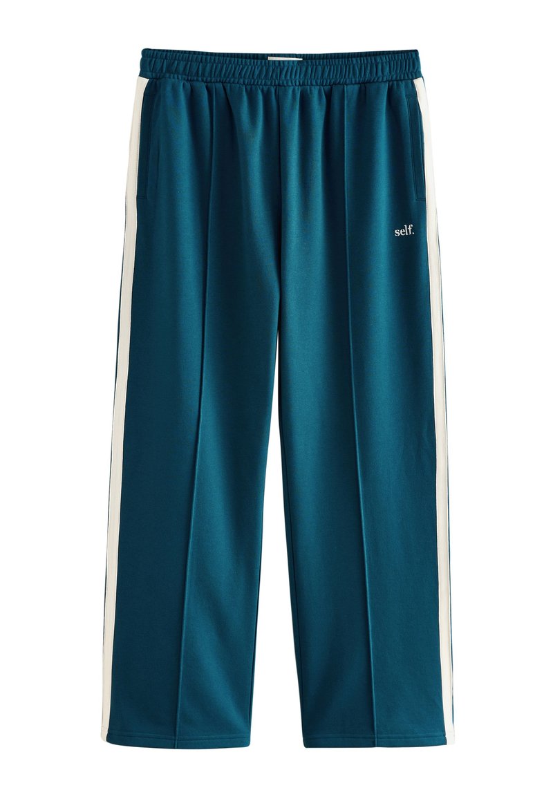 Türkisblaue Jogginghose mit elastischem Bund, Seitentaschen und weißen Streifen an den Seiten. Der Stoff wirkt weich und glatt.