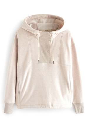 Sweat à capuche beige clair avec cordon de serrage, en tissu texturé, poches latérales et poignets côtelés. Présente un design de couture contrastant.