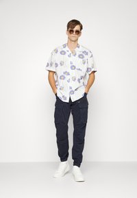 G-STAR ROVIC - Hlačami s stranskimi žepi - mazerine blue