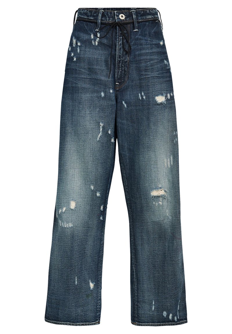 Mörkblå denimbyxor med lös passform, som har slitna detaljer, fransade kanter och en dragsko i midjan.