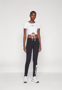 Champion GRAPHIC LEGGINGS - Leggings - black