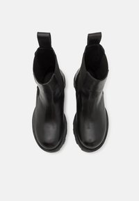 Diesel D-HAMMER CH W - Platform ankle boots - black