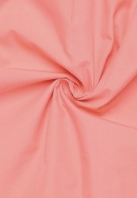 Coral pink fabric, smooth texture, lightweight, slightly wrinkled with a soft drape. No visible patterns or hardware details.