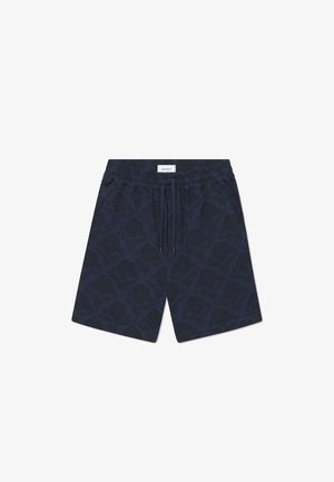 Navy swim shorts featuring a tonal floral pattern, elastic waistband with drawstring, and side pockets. Made from breathable fabric.