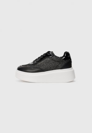 Black and silver platform sneakers with textured fabric and leather details, featuring a thick white sole and black lace-up closure.