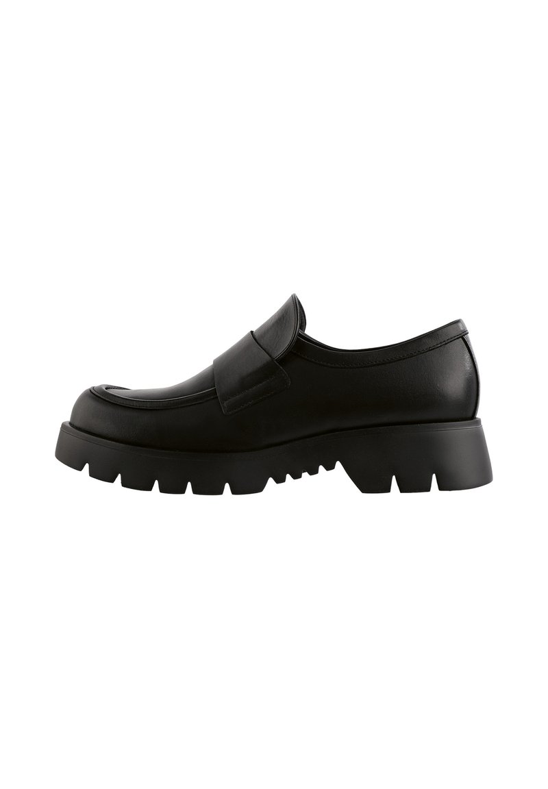 Chaussure noire en cuir à enfiler avec un bout arrondi, une tige rembourrée et une semelle en caoutchouc épaisse avec un motif de crampons.