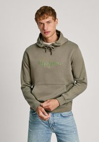 Sudadera verde con cordón, con "Pepe Jeans" bordado en verde claro. Mangas largas, bolsillo frontal, corte casual, material mezcla de algodón.