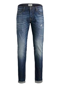 Vaqueros de denim azul ajustados con un lavado desvaído, parches desgastados y dobladillos enrollados. Con una cinturilla estándar y diseño clásico de cinco bolsillos.