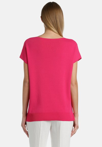 Bright pink short-sleeve sweater with a relaxed fit. Features a ribbed texture, boat neckline, and solid color design.