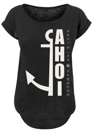 Schwarzes T-Shirt mit kurzen Ärmeln und lockerer Passform. Mit weißem Grafiktext "AHOI" und einem Ankerdesign, darunter "Knut & Jan Hamburg".