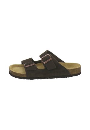 Brown suede slide sandal with two adjustable buckled straps and contoured cork footbed on black sole.