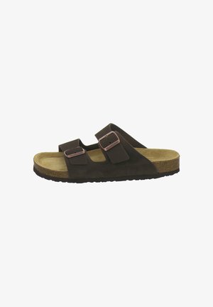 Brown suede slide sandal with two adjustable buckled straps and contoured cork footbed on black sole.