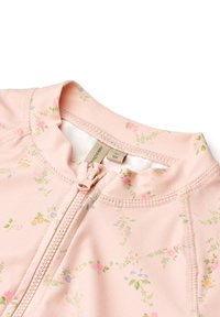 Maillot de bain zippé pour enfants de couleur rose avec un motif floral composé de petites fleurs multicolores, texture lisse et col arrondi.
